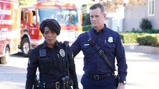 Athena and Bobby in uniform on 9-1-1
