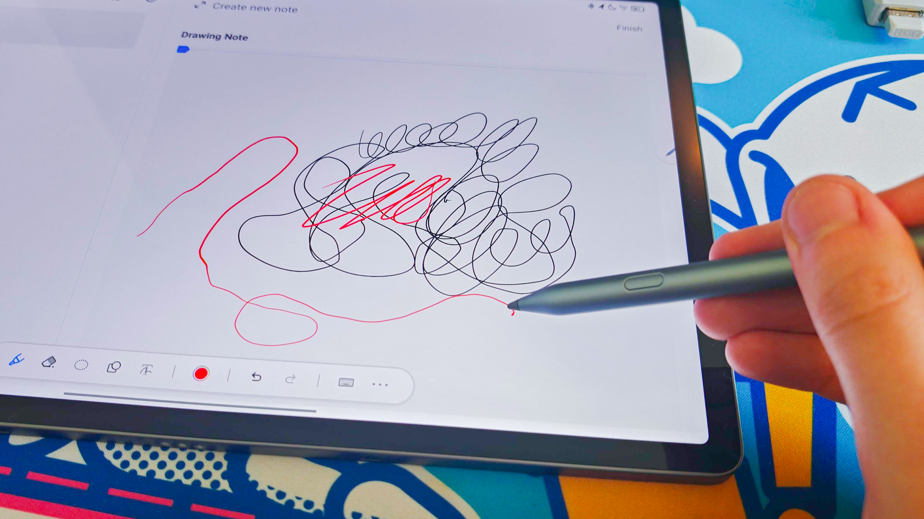 Lenovo Idea Tab Pro tablet with stylus showing front screen and back with cameras
