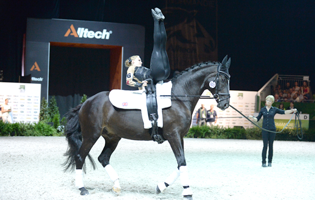 Lucy Phillips vaulting on Pitucelli with her mother Elizabeth lunging her at the 2014 WEG. Picture by Peter Nixon
