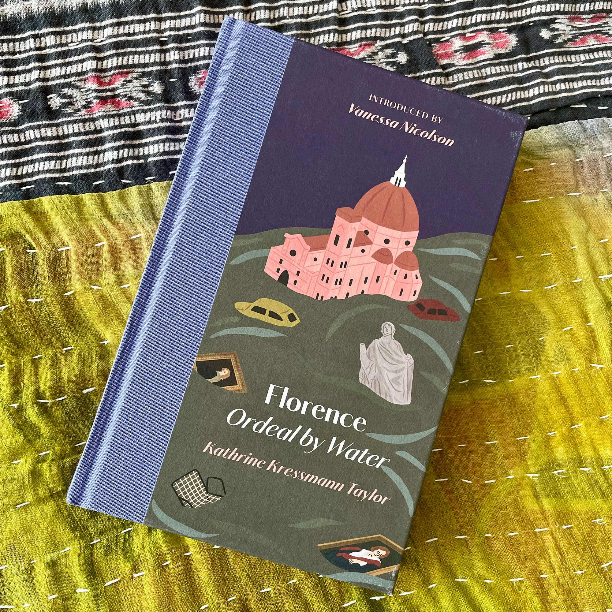'Florence Ordeal by Water' book resting on top of fabrics