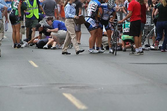 Rider's try to remount their bikes as paramedics arrive on the scene.