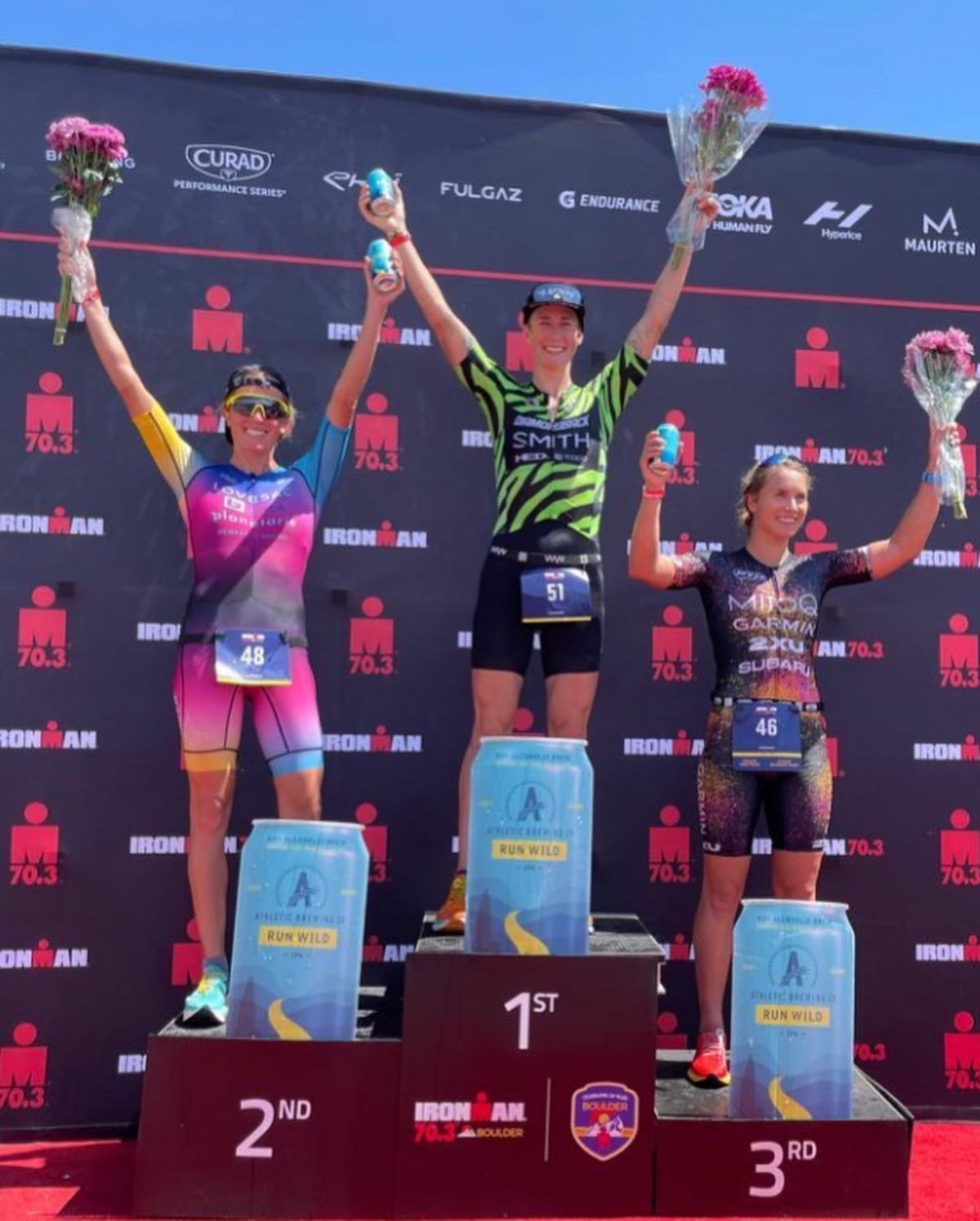 Rach McBride on the podium at the Boulder Ironman 70.3
