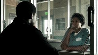 Damson Idris as Franklin Saint and Michael Hyatt as Cissy Saint talking in jail in Snowfall season 6