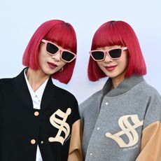 Ami Suzuki and Aya Suzuki of Amiaya attend the Stella McCartney Womenswear Fall/Winter 2024-2025 show as part of Paris Fashion Week on March 04, 2024 in Paris, France. 