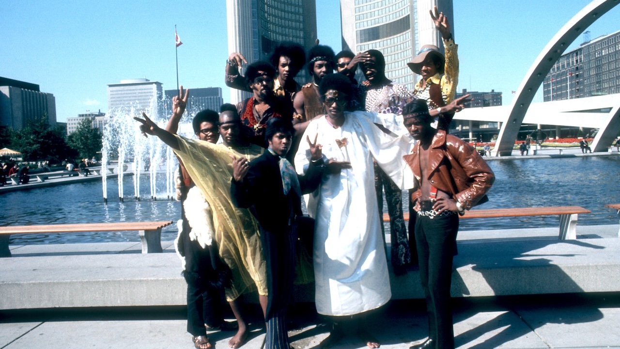 Bernie Worrell, George Clinton, Fuzzy Haskins, Eddie Hazel, Grady Thomas, unident., Calvin Simon, Tiki Fulwood (top right), Tawl Ross (bottom right), Ray Davis (center), Billy "Bass" Nelson of the funk band Parliament-Funkadelic pose for a portrait in circa 1971.