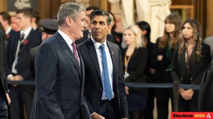 Prime Minister Rishi Sunak (right) walks with Labour Party leader Sir Keir Starmer.