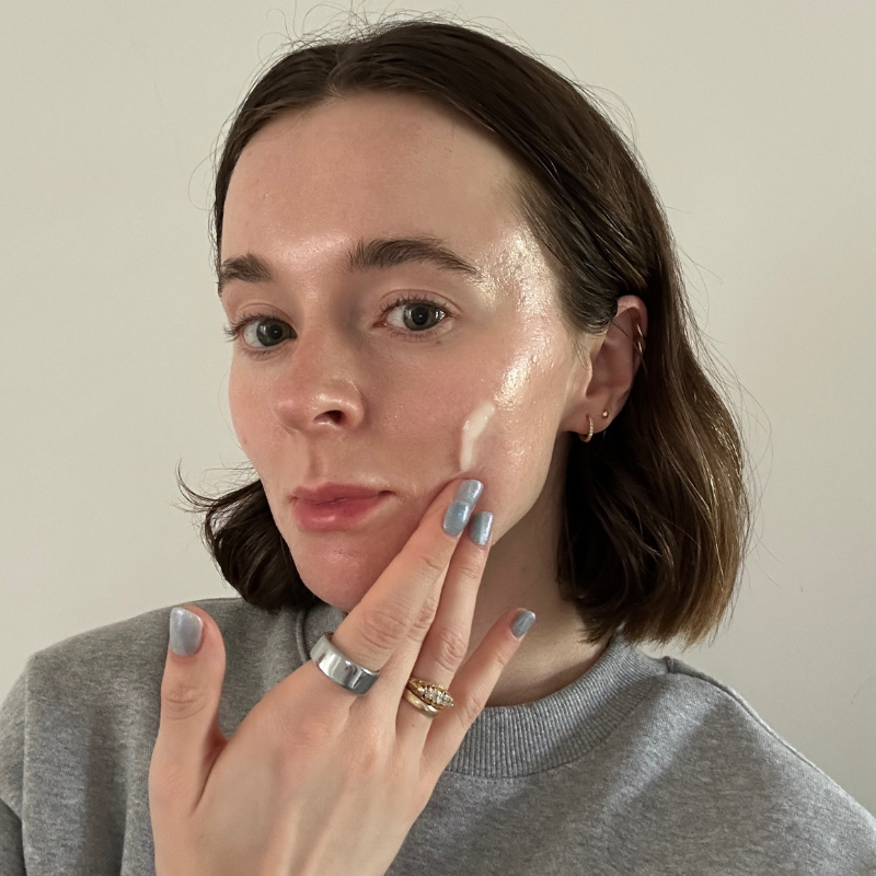 Grace applying the Charlotte Tilbury Magic Water Cream