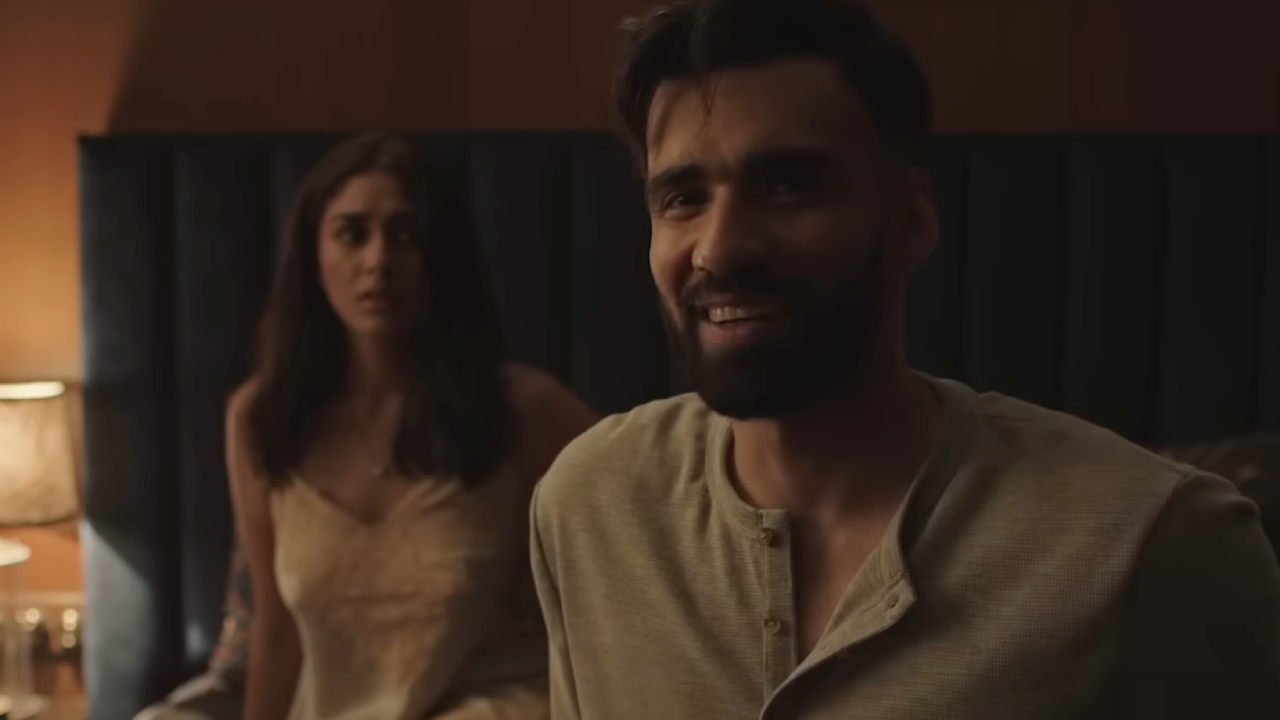 Mrunal Thakur looking concerned next to a smiling Avinash Tiwary in Ghost Stories