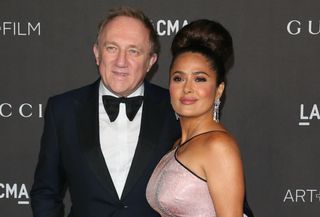 US-Mexican actress Salma Hayek (R) and husband French businessman Francois-Henri Pinault arrive for the 2019 LACMA Art+Film Gala at the Los Angeles County Museum of Art in Los Angeles on November 2, 2019. (Photo by Jean-Baptiste LACROIX / AFP) (Photo by JEAN-BAPTISTE LACROIX/AFP via Getty Images)