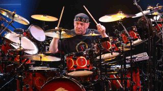 Rush’s Neil Peart playing drums onstage in 2007