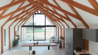 open plan kitchen diner in barn conversion with vaulted ceiling