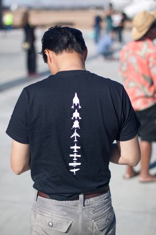 A Virgin Galactic T-shirt appears in the crowd at the company's Career Day event on Sept. 7, 2013, at Mojave Air and Space Port in Mojave, Calif.