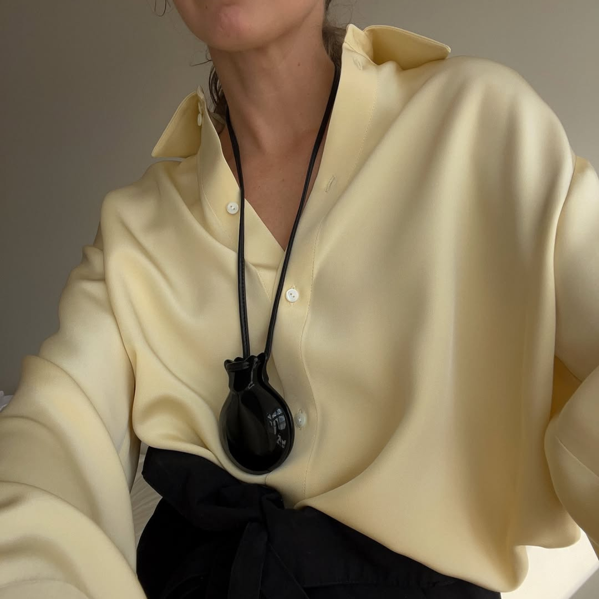 influencer wearing rope pendant necklaces