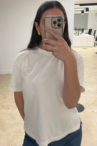 An image of Who What Wear UK SEO writer, Ava Gilchrist, wearing one of the best white t-shirts.