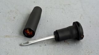 Topeak Plug n Tool tubeless repair tool opened up to show the tool and plugs