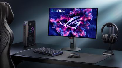 Asus ROG Strix OLED XG259QWPG Ace monitor shown on a desk next to keyboard and headset