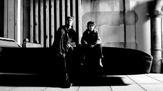 Ryan Gosling and Flynn Gray on the set of Star Wars Starfighter, sitting on a vehicle