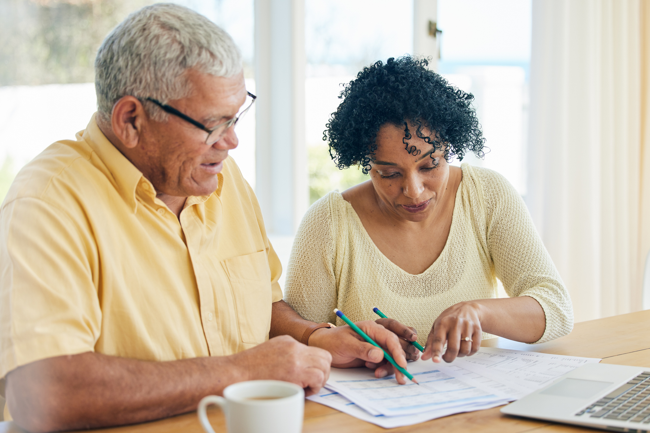 older couple doing paperwork