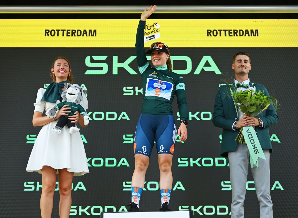 ROTTERDAM NETHERLANDS AUGUST 13 Charlotte Kool of The Netherlands and Team dsmfirmenich PostNL celebrates at podium as Green points jersey winner during the 3rd Tour de France Femmes 2024 Stage 3 a 679km individual time trial stage from Rotterdam to Rotterdam UCIWWT on August 13 2024 in Rotterdam Netherlands Photo by Dario BelingheriGetty Images