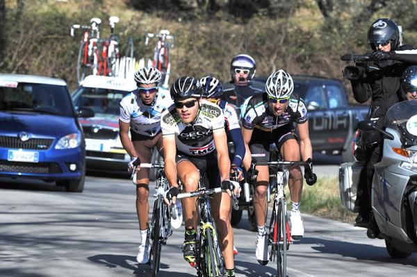 Mikael Cherel (AG2R La Mondiale), Damiano Margutti (De Rosa - Ceramica Flaminia), Matthias Brandle (Geox-TMC) and an unidentified rider off the front