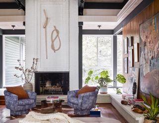 Rustic living room with fireplace and artwork