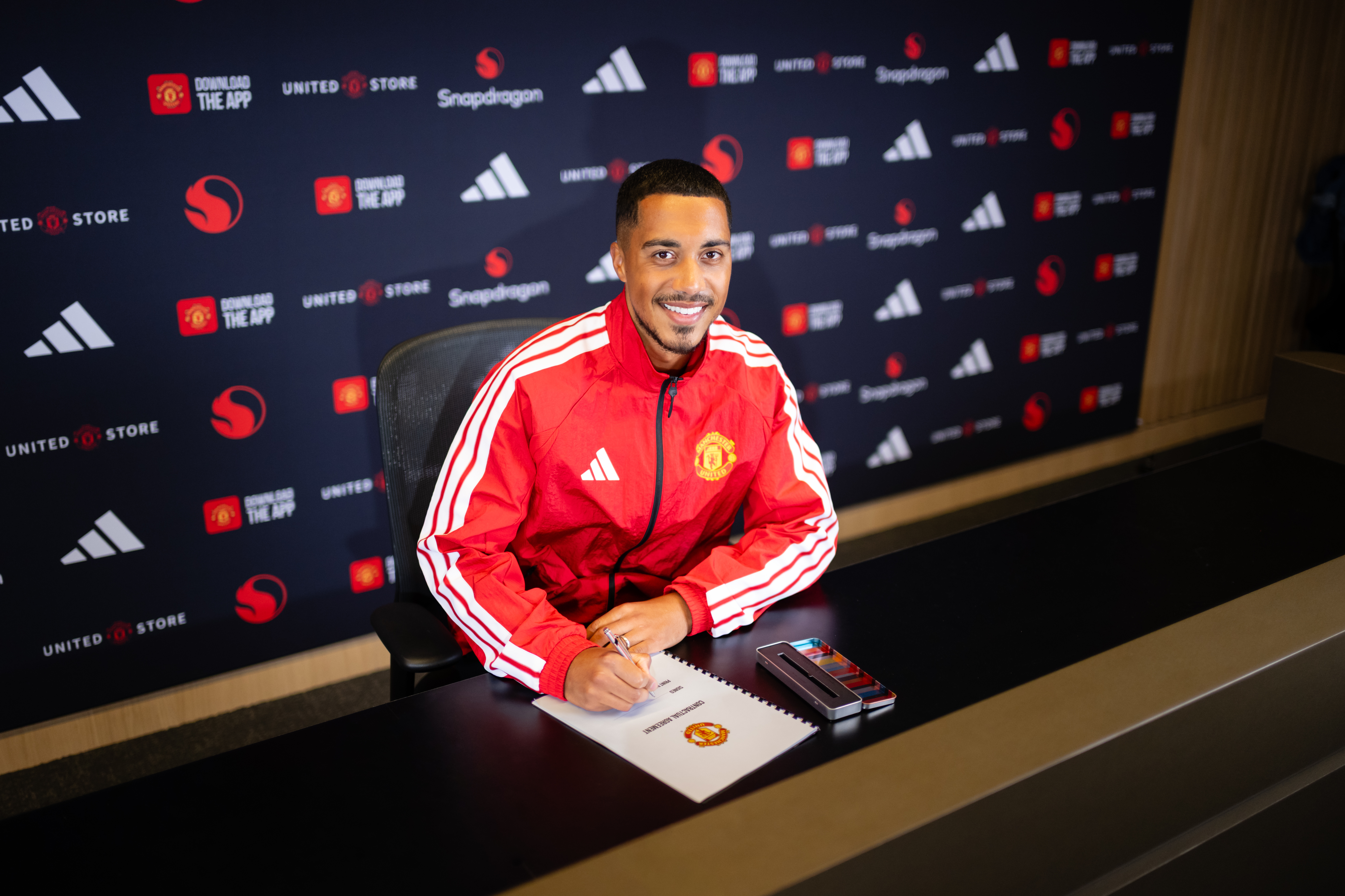 Youri Tielemans of Manchester United poses after signing for the club at Carrington Training Ground on July 14, 2026 in Manchester, England.