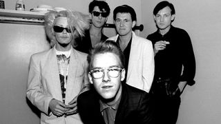 Portrait of the band Modern English backstage at the Park West in Chicago, Illinois, May 6, 1983. Counter clockwise from left, guitarist Gary McDowell, singer Robbie Grey, keyboard player Stepehn Walker, drummer Richard Brown, and bassist Michael Conroy.