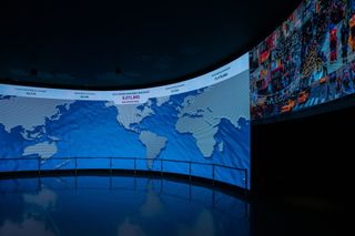 The Global Welcome Center at One World Observatory features a curved and expansive floor-to-ceiling Planar TVF Series LED video wall installation with a 1.8mm pixel pitch.