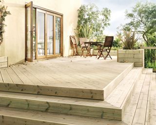 tiered deck with garden furniture set