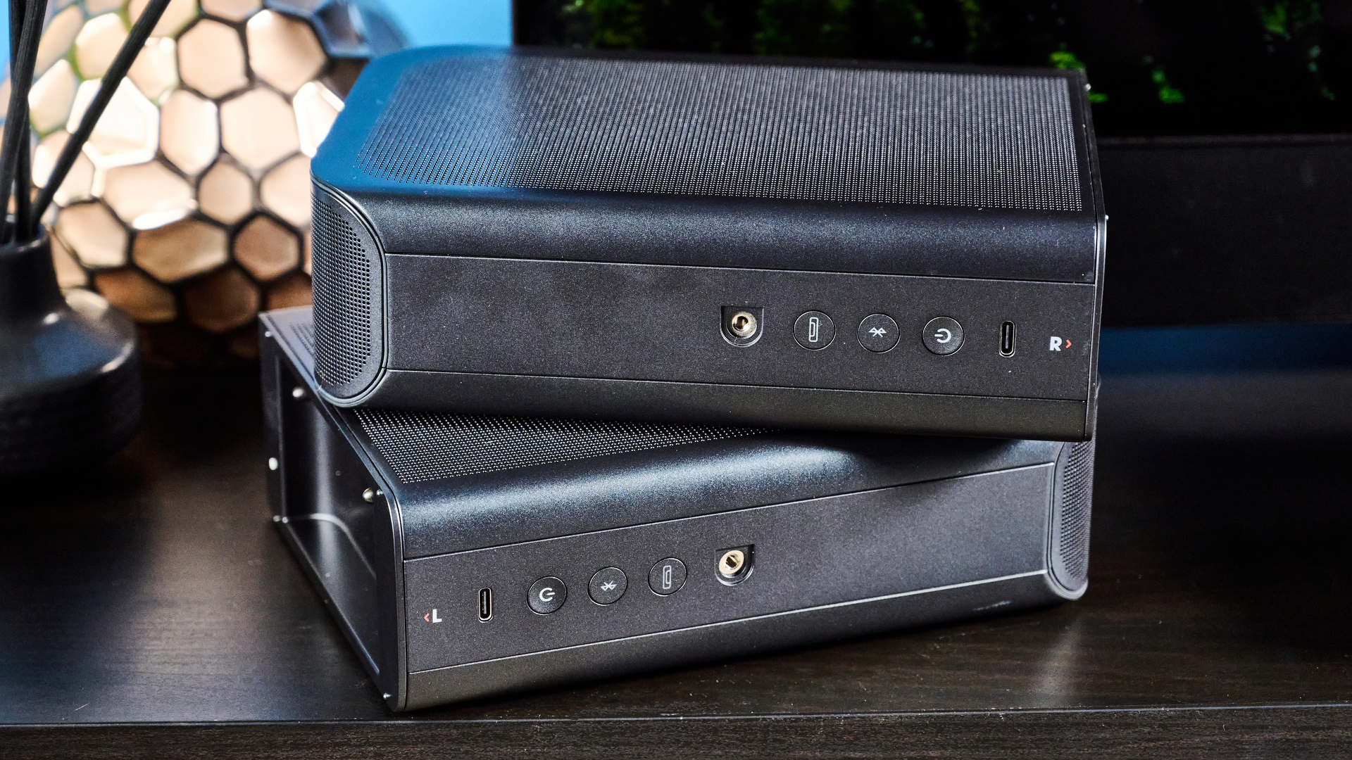 the jbl bar 1300x a black soundbar with HDMI ports, two surround channel speakers, a subwoofer wirelessly connected
