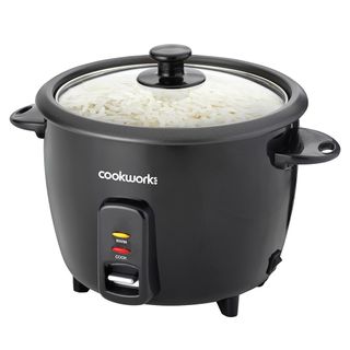 Black Cookworks rice cooker with a glass lid on a white background