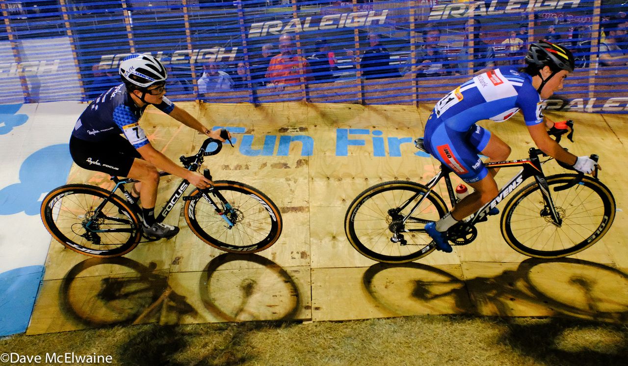 Sane Cant (BEL) riding ahead of Ellen Noble (USA) on the banked track