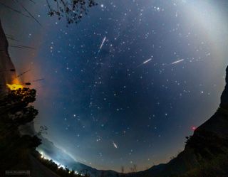 This composite view by astrophotographer Stojan Stojanovski shows many Perseid meteors captured by a fish-eye all sky camera over time on Aug. 12 and 13 for the 2019 meteor shower.