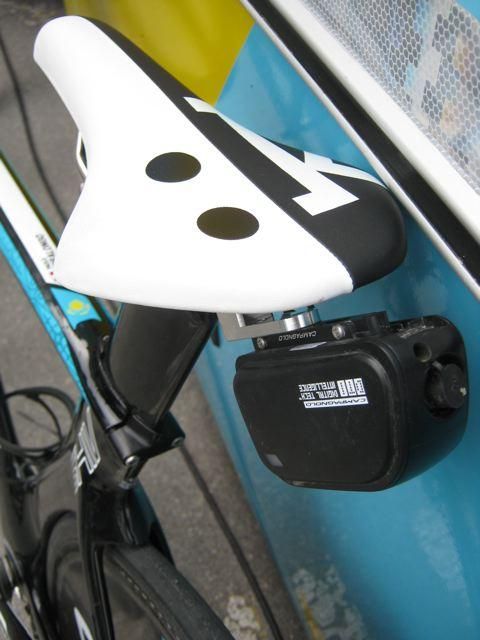 Astana place their Campagnolo batteries behind the saddle