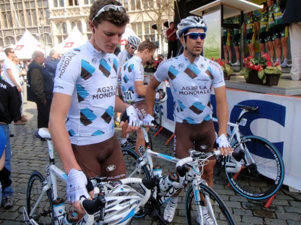 Ag2R-La Mondiale head back to their team bus after signing on