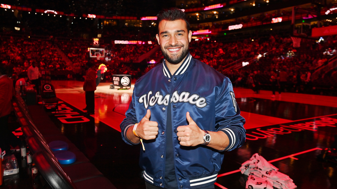 ATLANTA, GEORGIA - APRIL 02: Sam Asghari attends the game between the Dallas Mavericks and the Atlanta Hawks at State Farm Arena on April 02, 2023 in Atlanta, Georgia