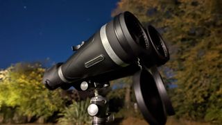 Celestron SkyMaster Pro 20x80 binoculars at night on a tripod