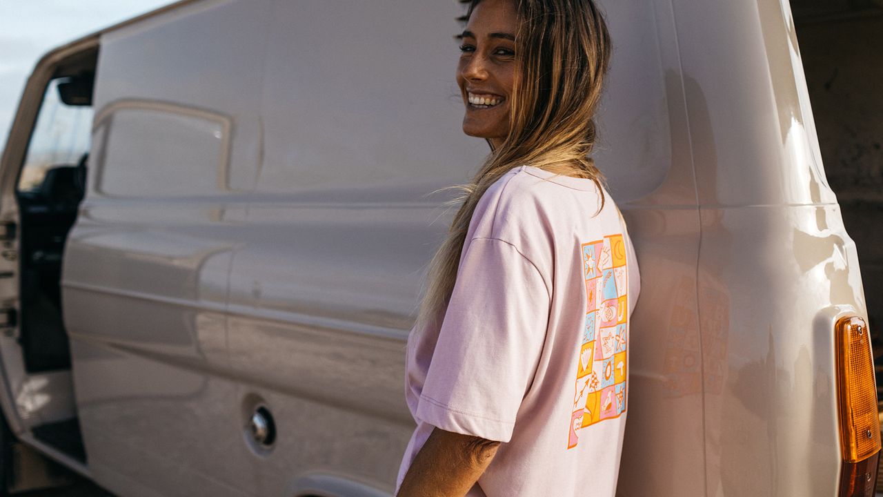People spending time outdoors wearing Finisterre clothes and wetsuits
