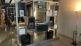 KEF speakers displayed on shelves