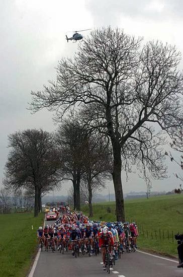The peloton rolls through the Ardenne countryside