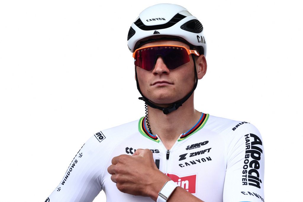 Alpecin - Deceuninck team's Dutch rider Mathieu Van Der Poel looks on at the start of the 121st edition of the Paris-Roubaix one-day classic cycling race, 260km between Compiegne and Roubaix, in Compiegne, northern France, on April 7, 2024. (Photo by Anne-Christine POUJOULAT / AFP)