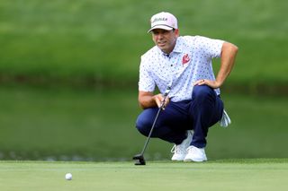 Sergio Garcia lines up a putt at the Masters
