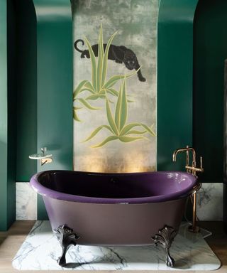 Green bathroom with purple freestanding bath and Jaguar leaf motif by Benjamin Moore and Kips Bay Decorator Show House