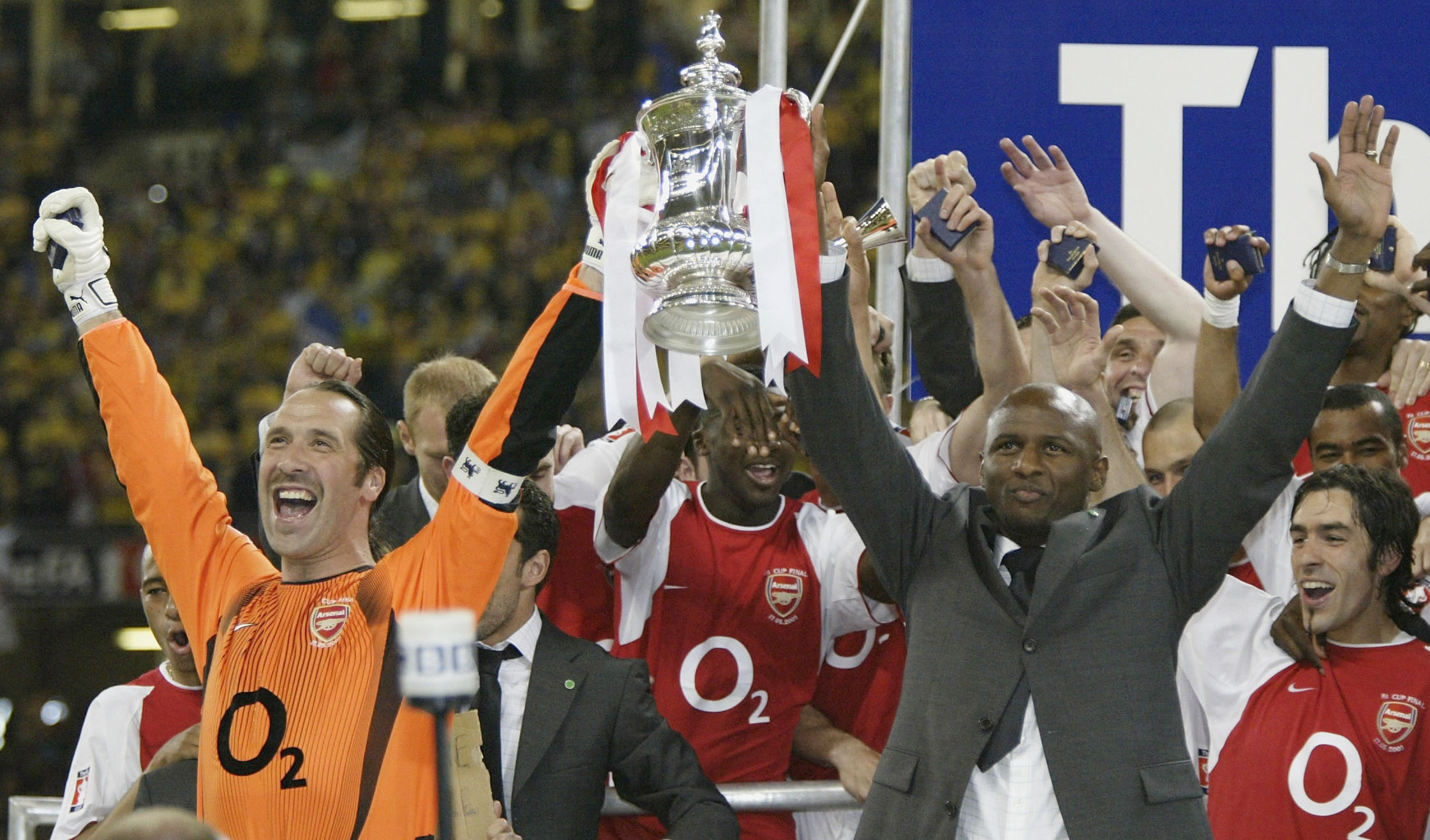 David Seaman and Patrick Vieira hold the FA Cup trophy aloft after Arsenal's win over Southampton in 2003.