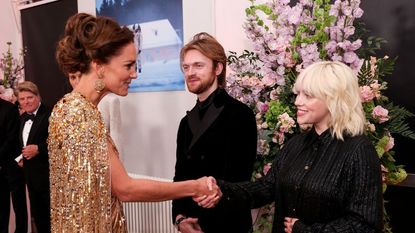 london, england september 28 catherine, duchess of cambridge meets no time to die performers finneas and billie eilish at the no time to die world premiere at royal albert hall on september 28, 2021 in london, england photo by chris jackson wpa poolgetty images
