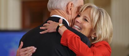 President Joe Biden hugs his wife Jill Biden