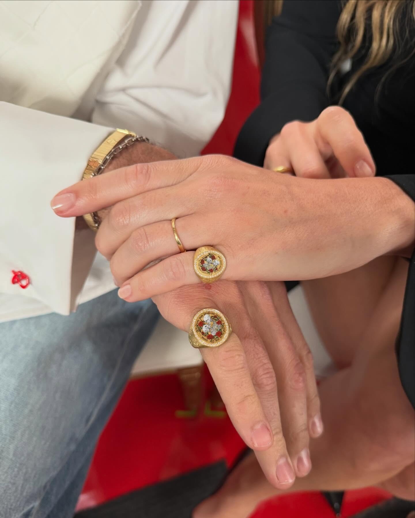 Margot Robbie and Jacob Elordie wear matching signet rings