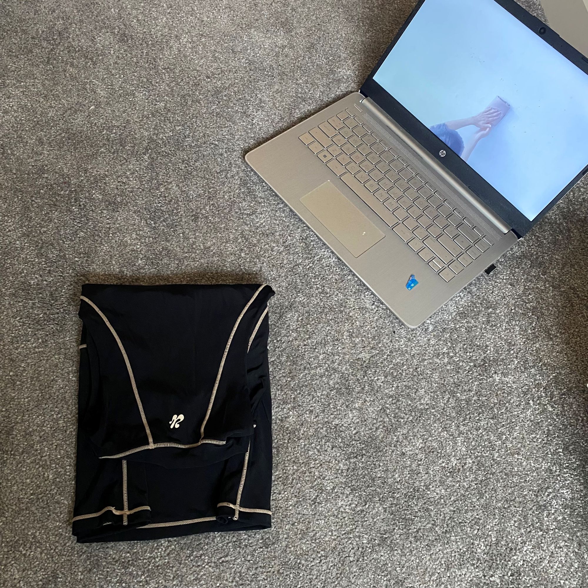 Katie trying the KonMari folding method to organise her clothes