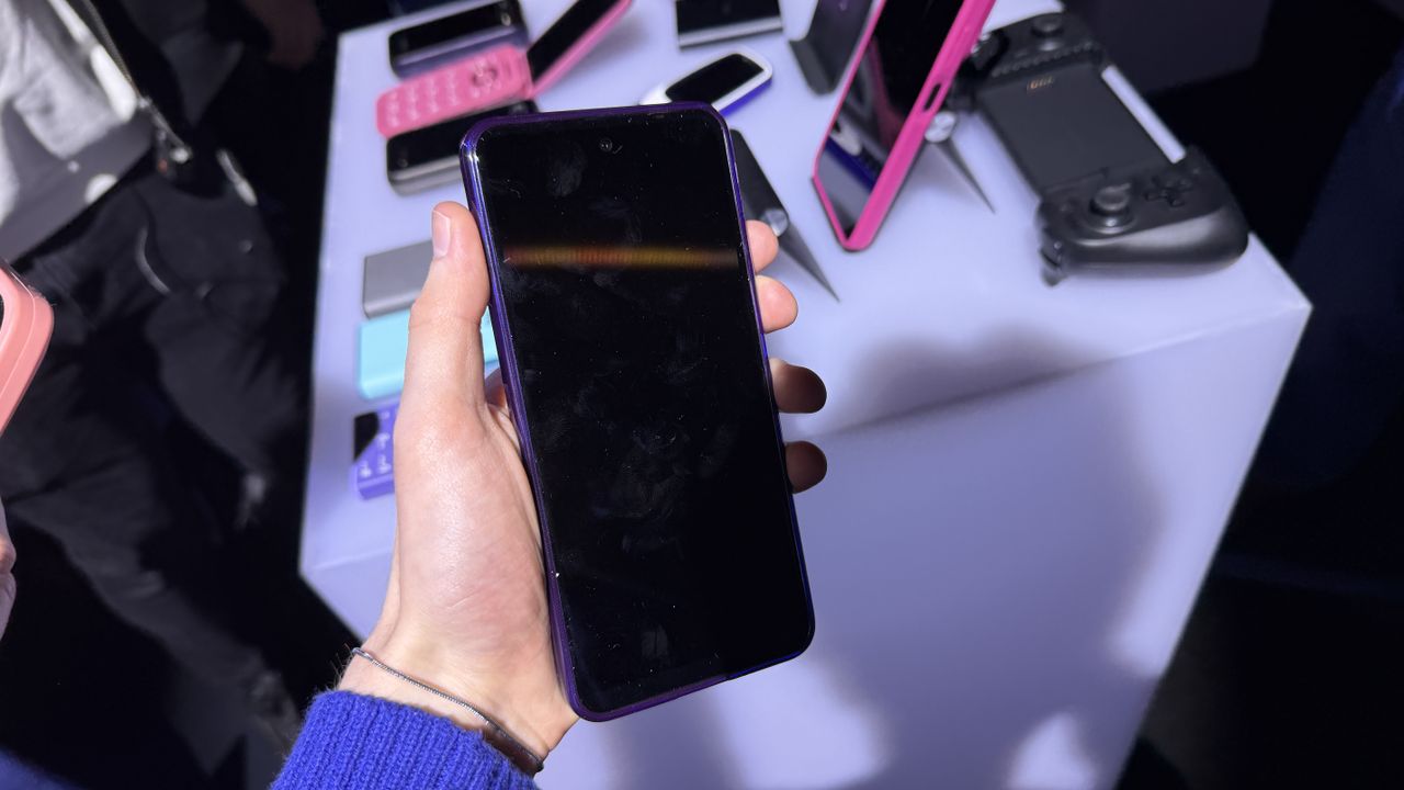 The HMD Fusion X1 in a purple case