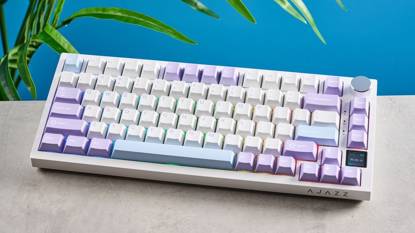 A white and purple Epomaker Ajazz AK820 Pro mechanical keyboard